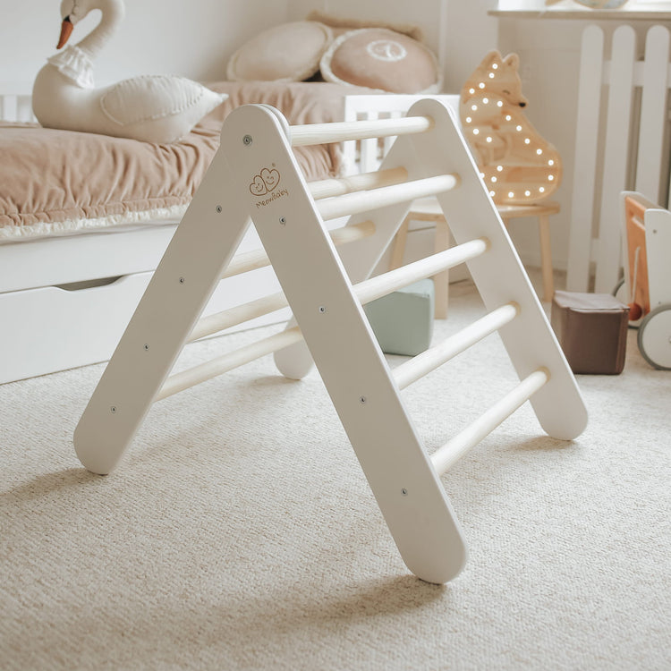 White Ladder House With a Pink Cover