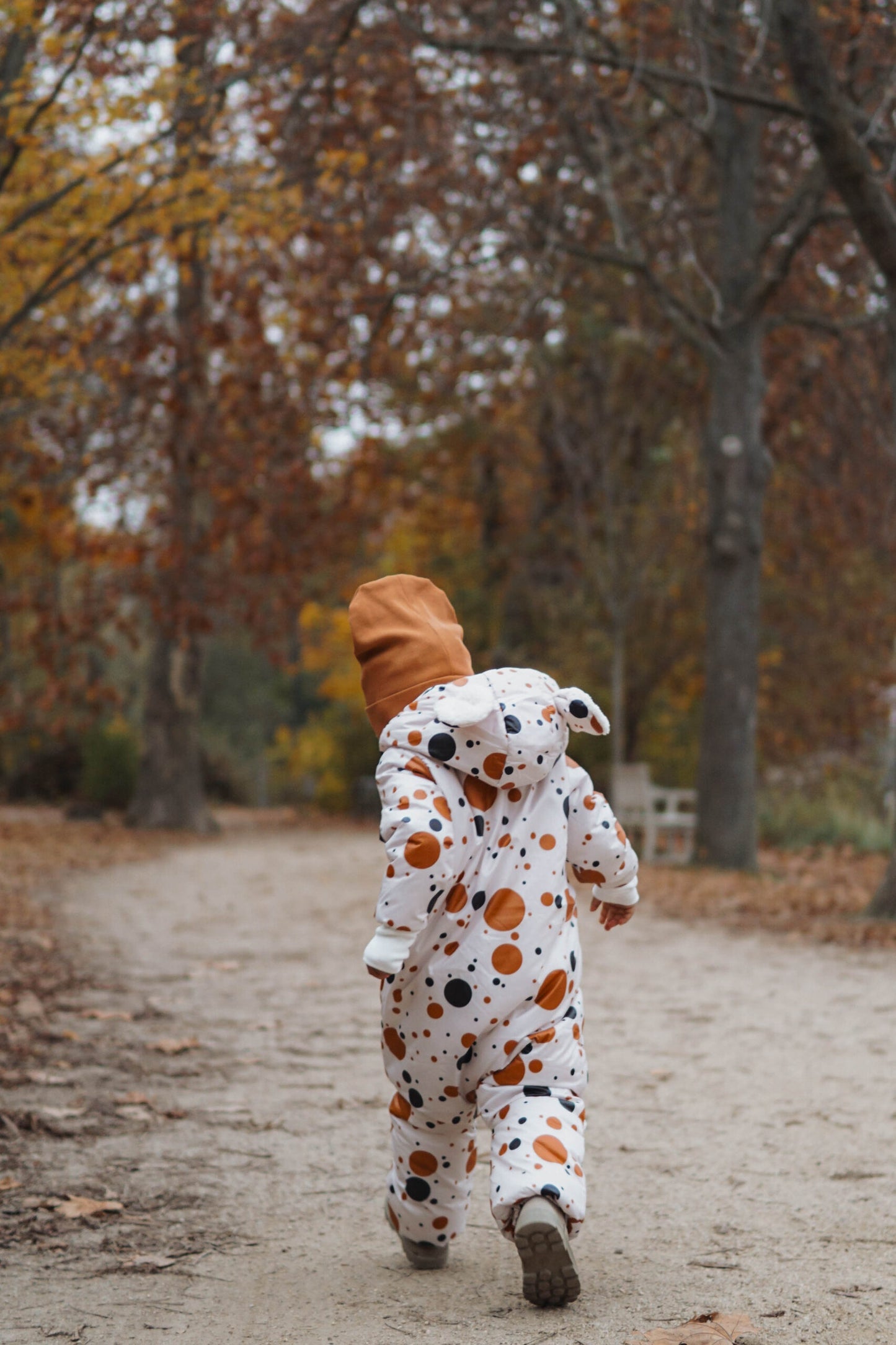 Winter Jumpsuit with Teddy Lining for Babies and Kids - Black and Orange Dots